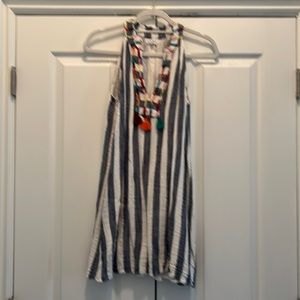 Cute navy and white striped dress with embroidered neckline.